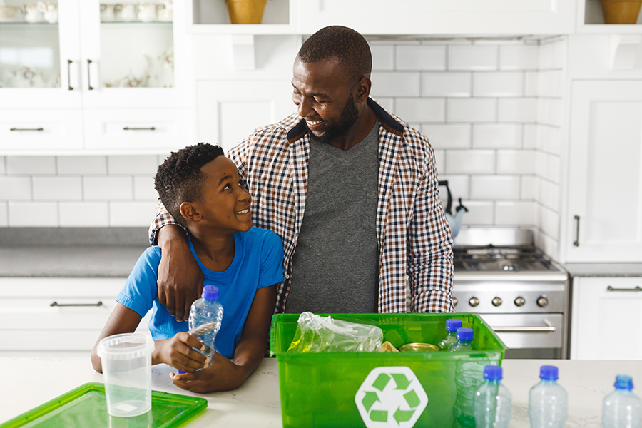 man and son with recycling