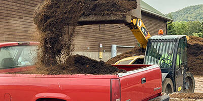 Loading Mulch Into Truck